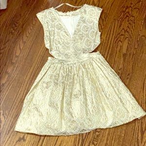 Gold brocade dress.